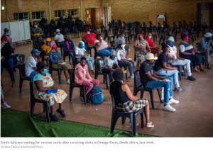 South Africans waiting for vaccine cards after receiving shots in Orange Farm, South Africa, last week.